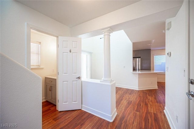 7388 Agonis St, Las Vegas, NV 89113 - hall featuring ornate columns and dark wood finished floors