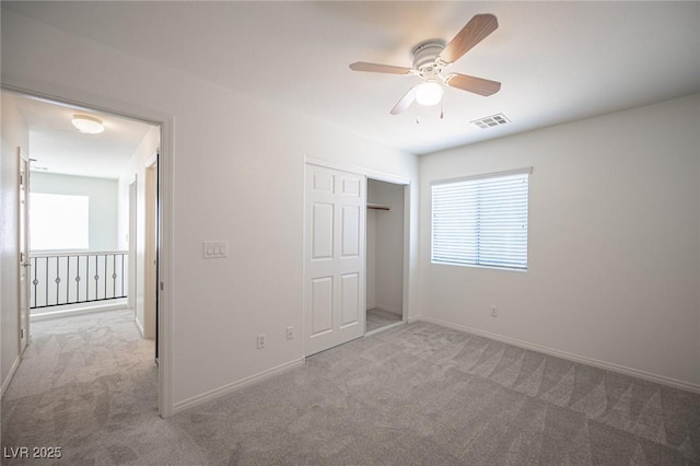 7388 Agonis St, Las Vegas, NV 89113 - unfurnished bedroom with carpet flooring, a closet, and a ceiling fan