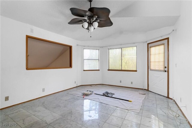 9109 Anchor Cove Ct, Las Vegas, NV 89117 - empty room featuring marble look tile flooring and a ceiling fan