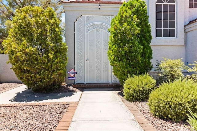 9109 Anchor Cove Ct, Las Vegas, NV 89117 - entrance to property with stucco siding