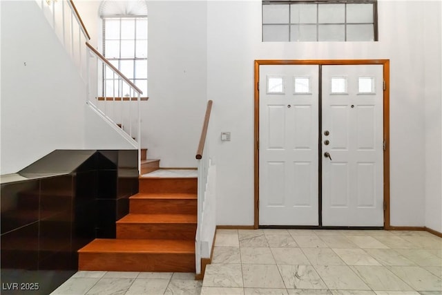 9109 Anchor Cove Ct, Las Vegas, NV 89117 - entryway with light marble finish floors and stairs