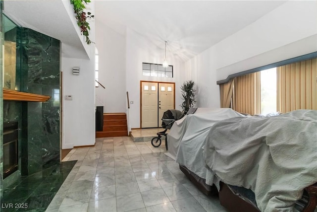 9109 Anchor Cove Ct, Las Vegas, NV 89117 - bedroom featuring marble look tile flooring and baseboards