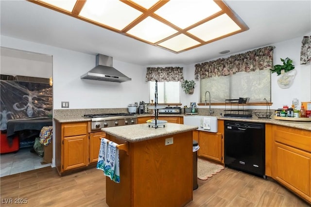 9109 Anchor Cove Ct, Las Vegas, NV 89117 - kitchen with black dishwasher, wall chimney range hood, light wood-style flooring, and a kitchen island