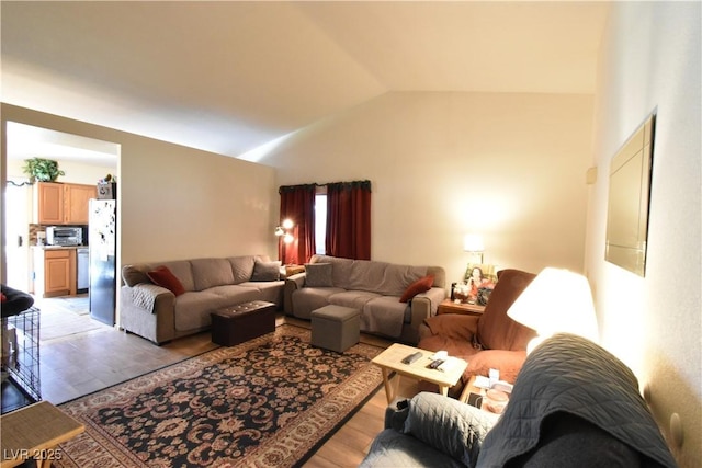 5105 Wildroot Rd, Las Vegas, NV 89130 - living area with light wood-style floors and vaulted ceiling