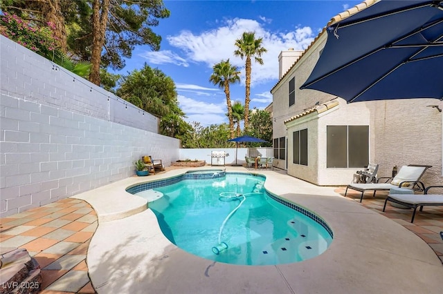 2535 Cortina Ave, Henderson, NV 89074 - view of swimming pool featuring a fenced backyard and a patio