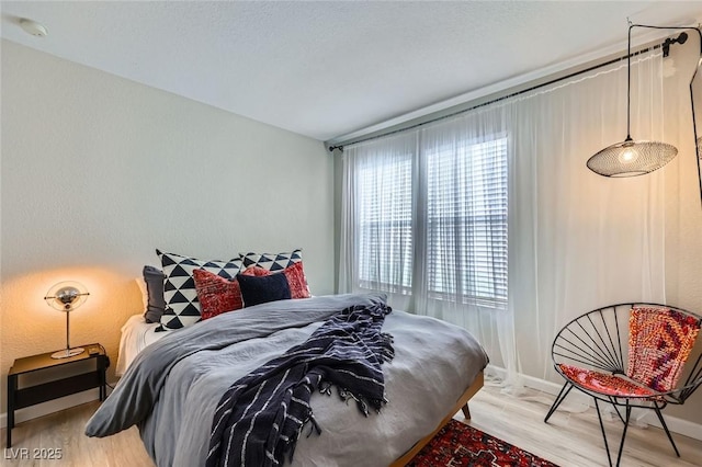 2535 Cortina Ave, Henderson, NV 89074 - bedroom with wood finished floors and baseboards