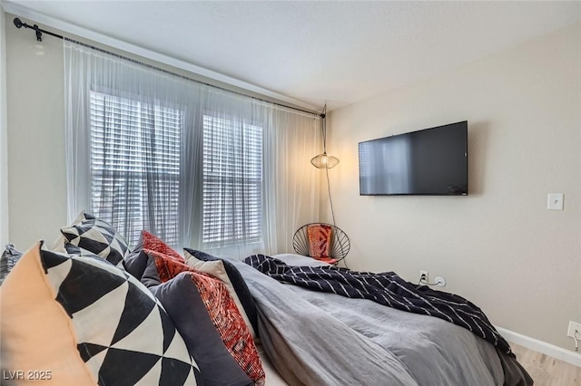 2535 Cortina Ave, Henderson, NV 89074 - bedroom featuring wood finished floors and baseboards