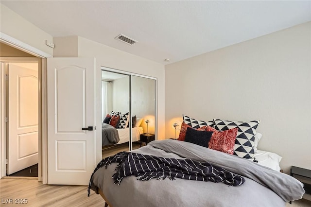 2535 Cortina Ave, Henderson, NV 89074 - bedroom with light wood-style floors and a closet