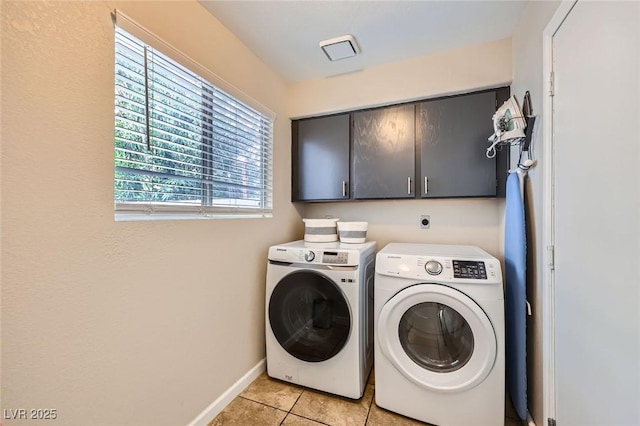 2535 Cortina Ave, Henderson, NV 89074 - washroom featuring cabinet space, independent washer and dryer, and light tile patterned floors