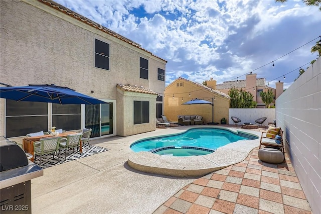 2535 Cortina Ave, Henderson, NV 89074 - view of swimming pool with a patio area, a fenced backyard, a pool with connected hot tub, and grilling area