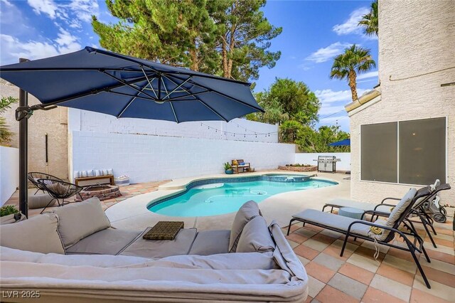 2535 Cortina Ave, Henderson, NV 89074 - view of swimming pool featuring outdoor lounge area, a patio area, a fenced backyard, grilling area, and a pool with connected hot tub