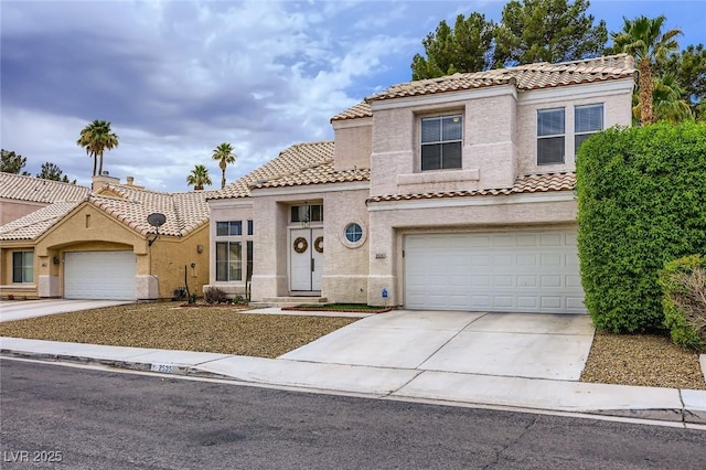 2535 Cortina Ave, Henderson, NV 89074 - mediterranean / spanish home featuring a tile roof and stucco siding