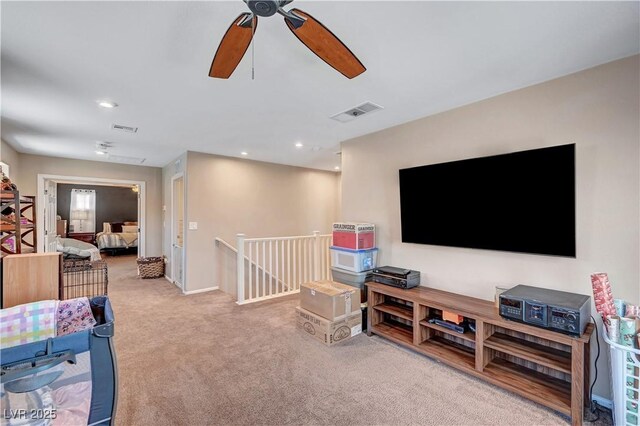 6322 Highledge St, North Las Vegas, NV 89081 - carpeted living area with ceiling fan and recessed lighting