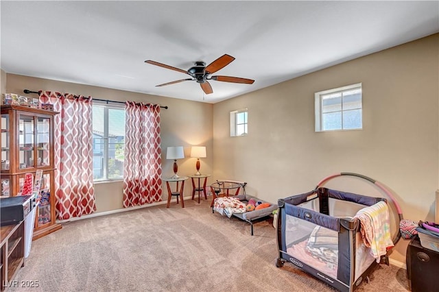 6322 Highledge St, North Las Vegas, NV 89081 - living area featuring a ceiling fan and carpet flooring