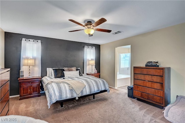 6322 Highledge St, North Las Vegas, NV 89081 - carpeted bedroom featuring ceiling fan and ensuite bath