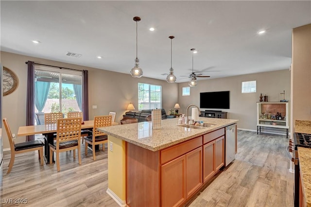 6322 Highledge St, North Las Vegas, NV 89081 - kitchen with open floor plan, stainless steel appliances, light wood-style floors, a ceiling fan, and recessed lighting