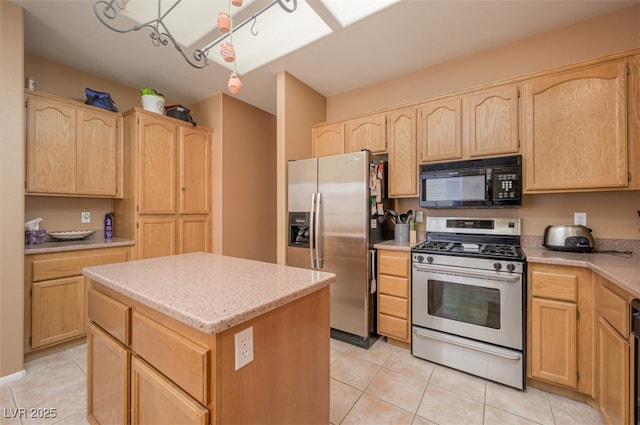 3251 Pheasant Hills Way, Laughlin, NV 89029 - kitchen with appliances with stainless steel finishes, light brown cabinets, and light tile patterned floors