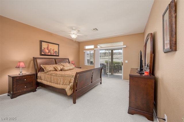 3251 Pheasant Hills Way, Laughlin, NV 89029 - bedroom featuring access to exterior, light carpet, and ceiling fan