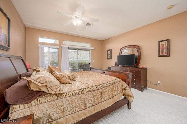 3251 Pheasant Hills Way, Laughlin, NV 89029 - carpeted bedroom featuring ceiling fan and access to outside