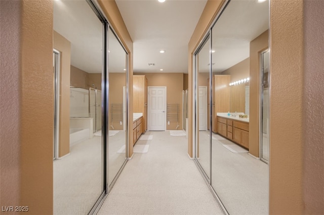3251 Pheasant Hills Way, Laughlin, NV 89029 - hallway featuring recessed lighting and light colored carpet