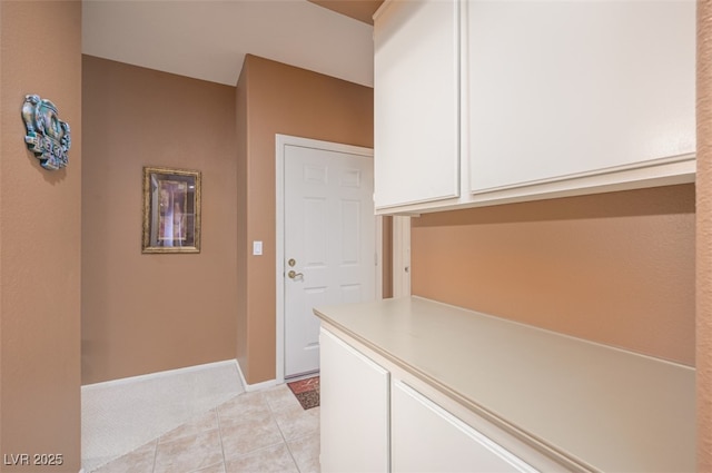 3251 Pheasant Hills Way, Laughlin, NV 89029 - laundry area with baseboards and light tile patterned floors