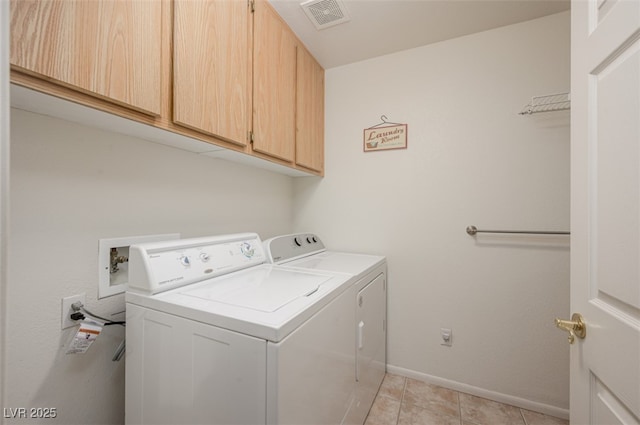 3251 Pheasant Hills Way, Laughlin, NV 89029 - laundry room with cabinet space, independent washer and dryer, and light tile patterned flooring