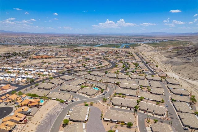 3251 Pheasant Hills Way, Laughlin, NV 89029 - aerial view of property and surrounding area with nearby suburban area and mountains