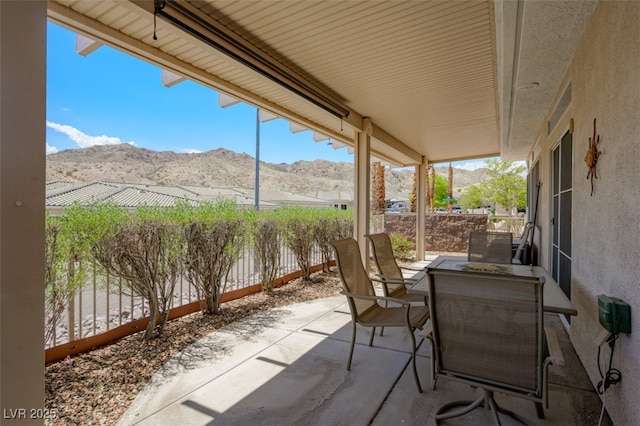 3251 Pheasant Hills Way, Laughlin, NV 89029 - view of patio featuring outdoor dining area and a mountain view