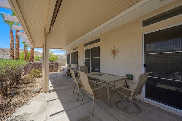 3251 Pheasant Hills Way, Laughlin, NV 89029 - view of patio / terrace with outdoor dining area and a mountain view