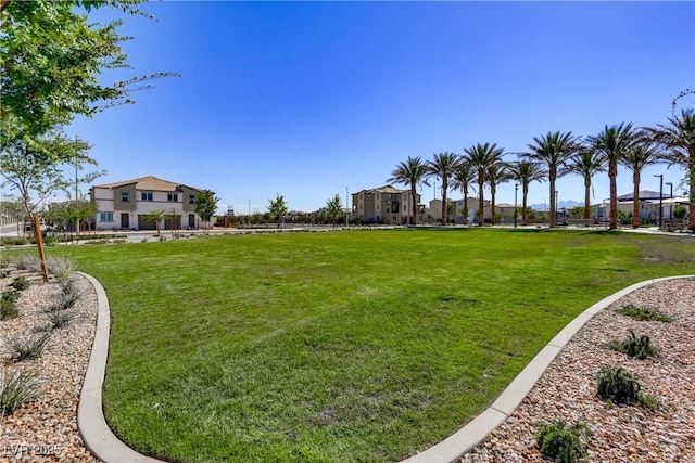 6831 Crimson Shadow St, North Las Vegas, NV 89086 - view of home's community featuring a lawn