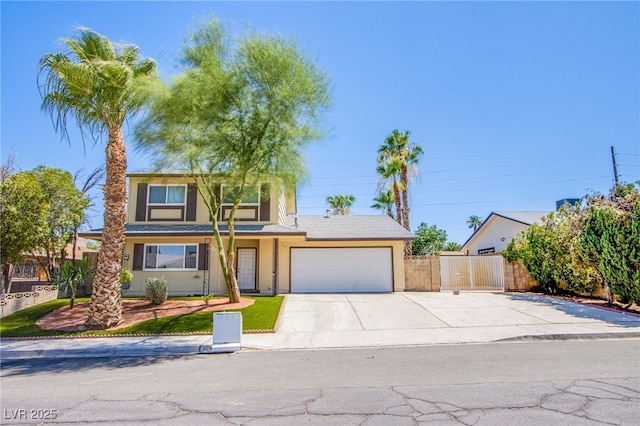 4307 Lucas Ave, Las Vegas, NV 89120 - traditional-style house with an attached garage, concrete driveway, and stucco siding
