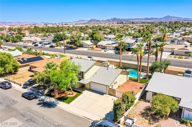 4307 Lucas Ave, Las Vegas, NV 89120 - aerial perspective of suburban area featuring a mountainous background and a pool area