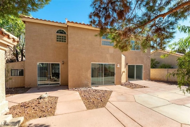 1846 Autumn Gold Ave, Las Vegas, NV 89123 - rear view of property with stucco siding and a patio area