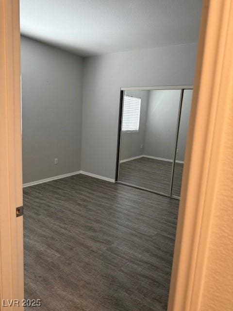 5250 S Rainbow Blvd Unit 1155, Las Vegas, NV 89118 - empty room featuring dark wood finished floors and baseboards