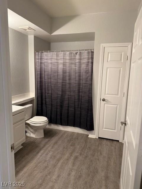 5250 S Rainbow Blvd Unit 1155, Las Vegas, NV 89118 - full bathroom with vanity, wood finished floors, and a shower with curtain