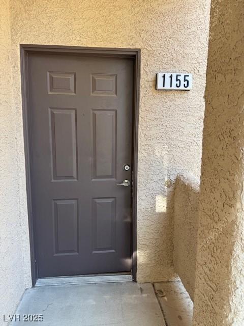5250 S Rainbow Blvd Unit 1155, Las Vegas, NV 89118 - property entrance featuring stucco siding