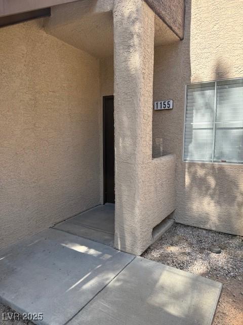 5250 S Rainbow Blvd Unit 1155, Las Vegas, NV 89118 - doorway to property featuring stucco siding
