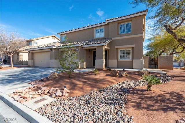 212 Stour Ln, Las Vegas, NV 89144 - view of front facade featuring stucco siding, driveway, a tiled roof, and a garage
