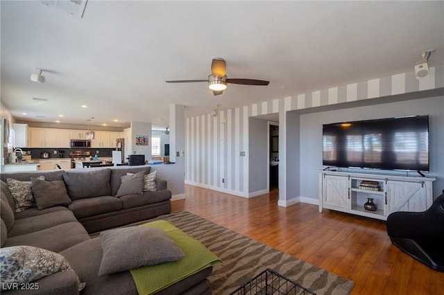 212 Stour Ln, Las Vegas, NV 89144 - living area with wood finished floors, a ceiling fan, and recessed lighting