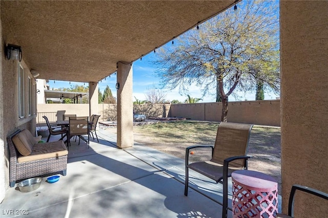 212 Stour Ln, Las Vegas, NV 89144 - fenced backyard featuring outdoor dining area and a patio area