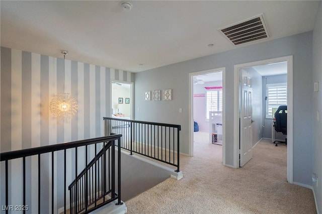 212 Stour Ln, Las Vegas, NV 89144 - hallway featuring an upstairs landing, carpet floors, an office area, and wallpapered walls