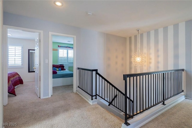 212 Stour Ln, Las Vegas, NV 89144 - stairs with carpet floors and a chandelier
