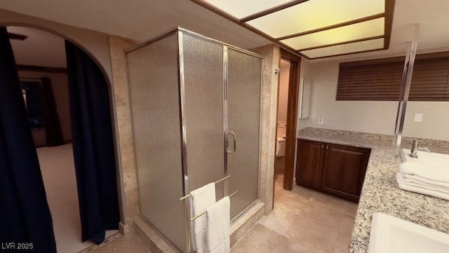 3430 Tanto Cir, Las Vegas, NV 89121 - bathroom with vanity, a shower stall, and tile patterned flooring
