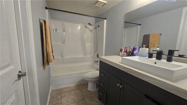 2941 Country Manor Ln Unit 27, Las Vegas, NV 89115 - bathroom with vanity, bathing tub / shower combination, a textured wall, and tile patterned flooring