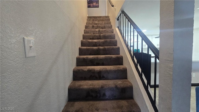 2941 Country Manor Ln Unit 27, Las Vegas, NV 89115 - stairway with a textured wall