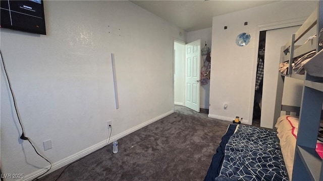 2941 Country Manor Ln Unit 27, Las Vegas, NV 89115 - bedroom with carpet and baseboards
