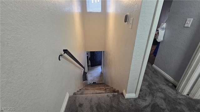 2941 Country Manor Ln Unit 27, Las Vegas, NV 89115 - stairs with a textured wall and carpet