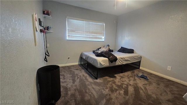 2941 Country Manor Ln Unit 27, Las Vegas, NV 89115 - carpeted bedroom featuring baseboards