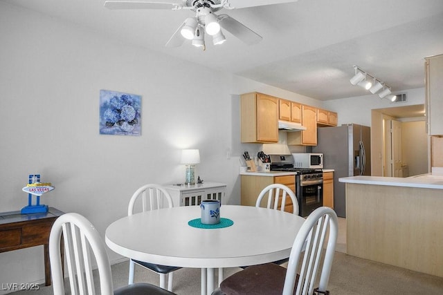 2902 Aztec Lily Ln, Henderson, NV 89074 - dining space featuring a ceiling fan and light carpet