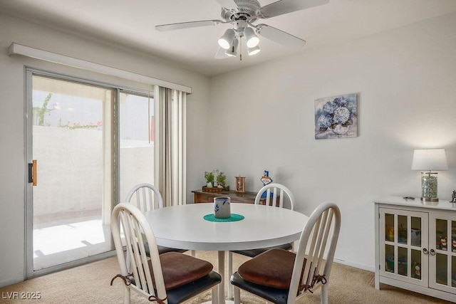 2902 Aztec Lily Ln, Henderson, NV 89074 - dining area featuring light colored carpet and ceiling fan